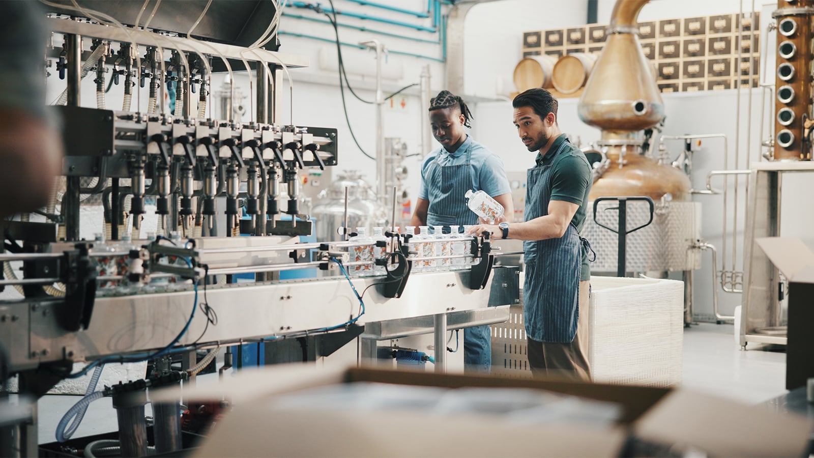 Woman standing at a half built car.
