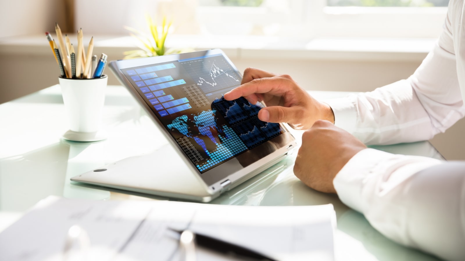 Man working on his tablet.
