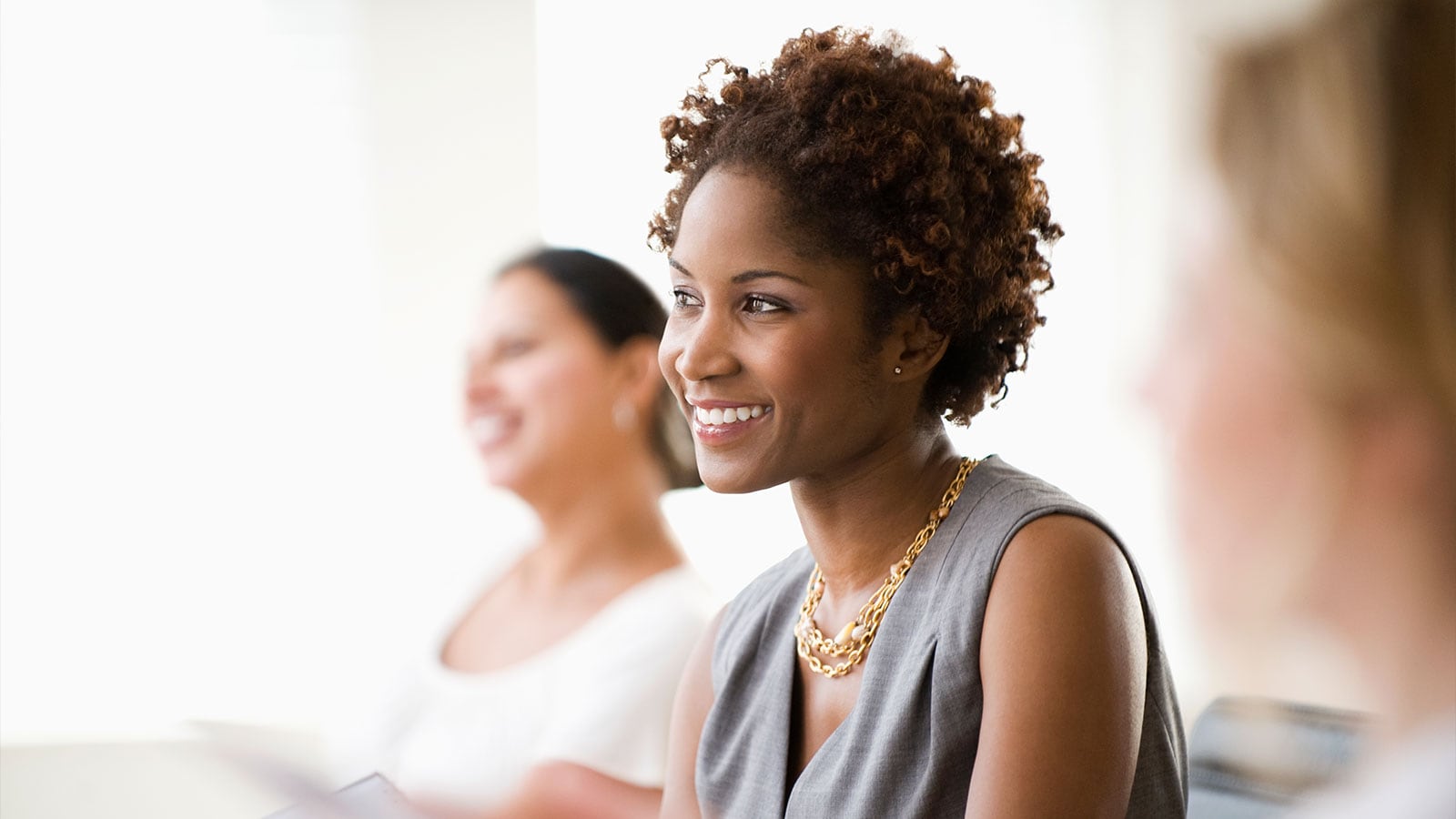 Woman smiling.
