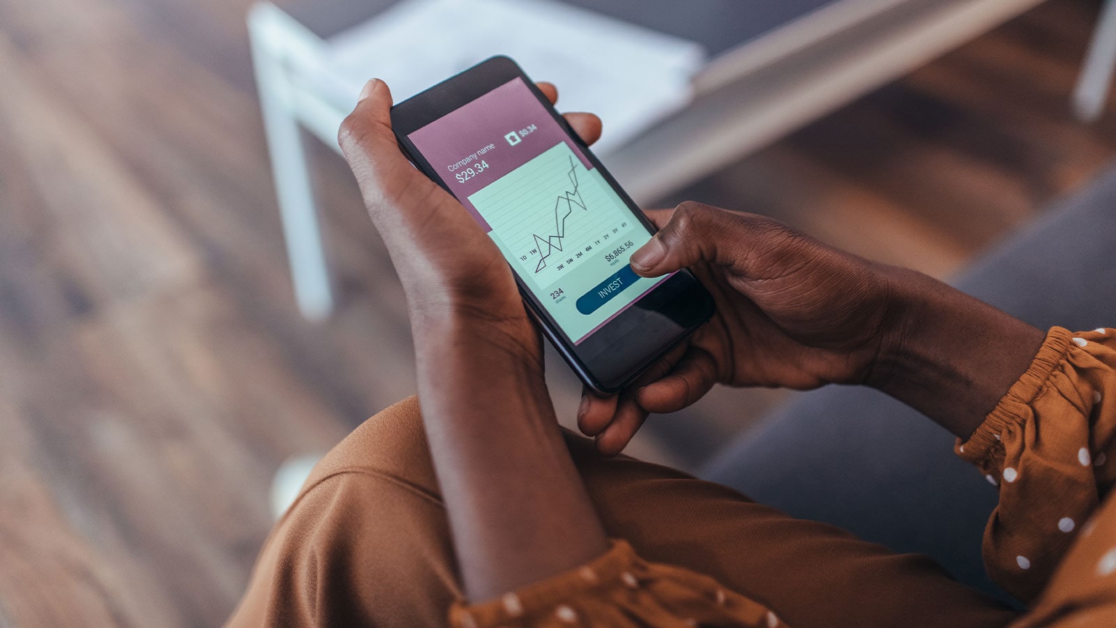 Woman checking her financial score on her cellphone.