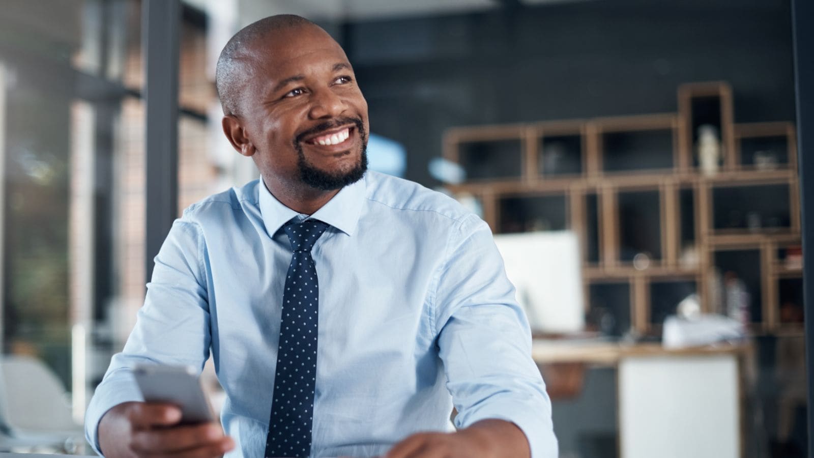 Image of a man smiling.
