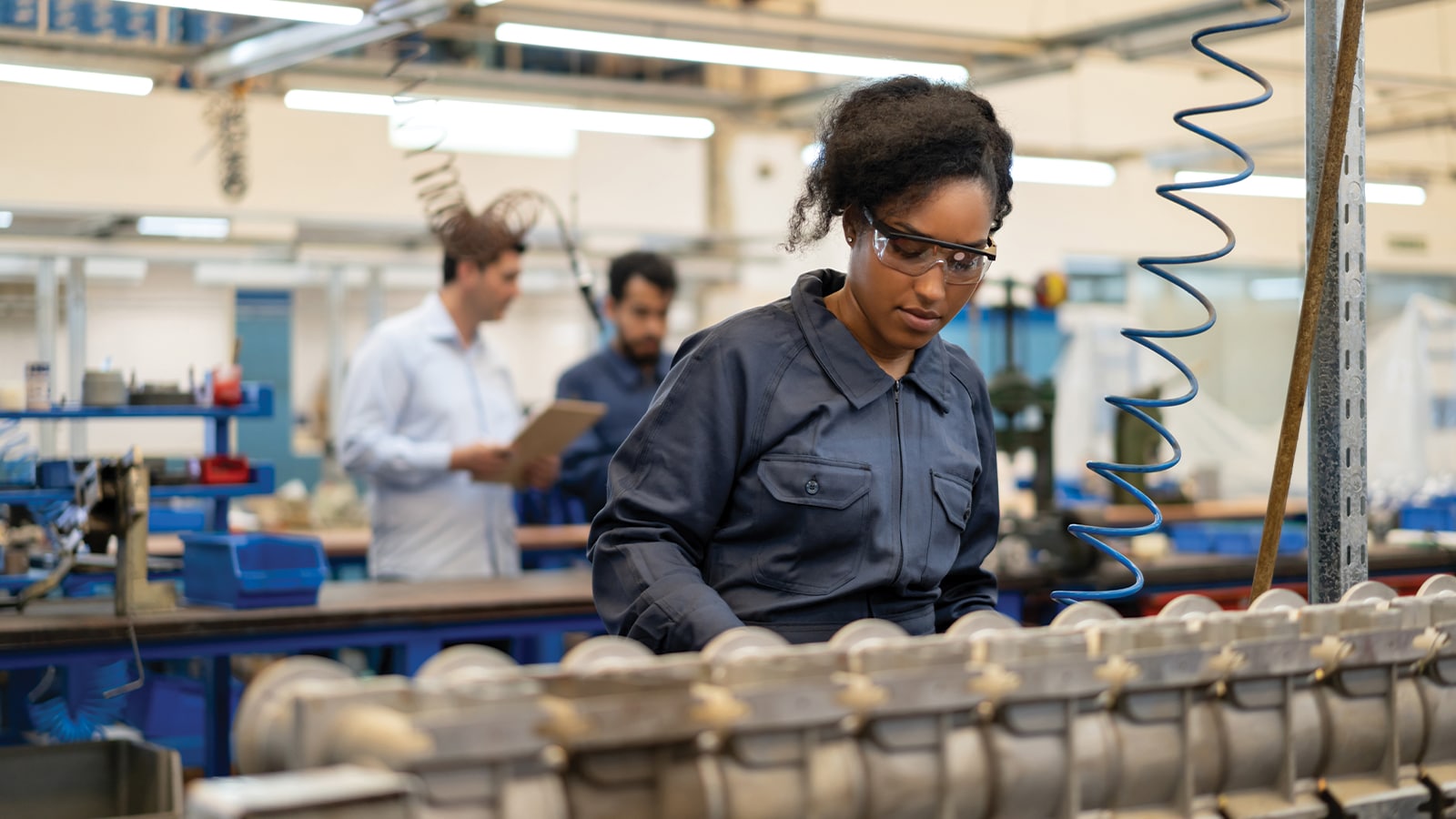 Woman working on manufaturing goods.