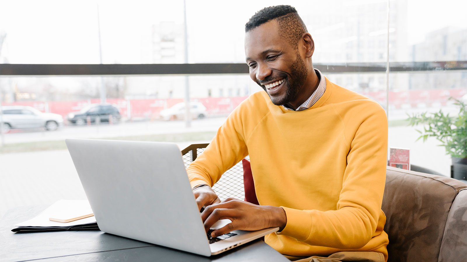 Man working on his laptop.