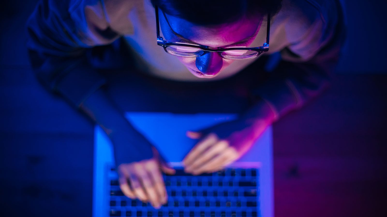 Man working on a computer.
