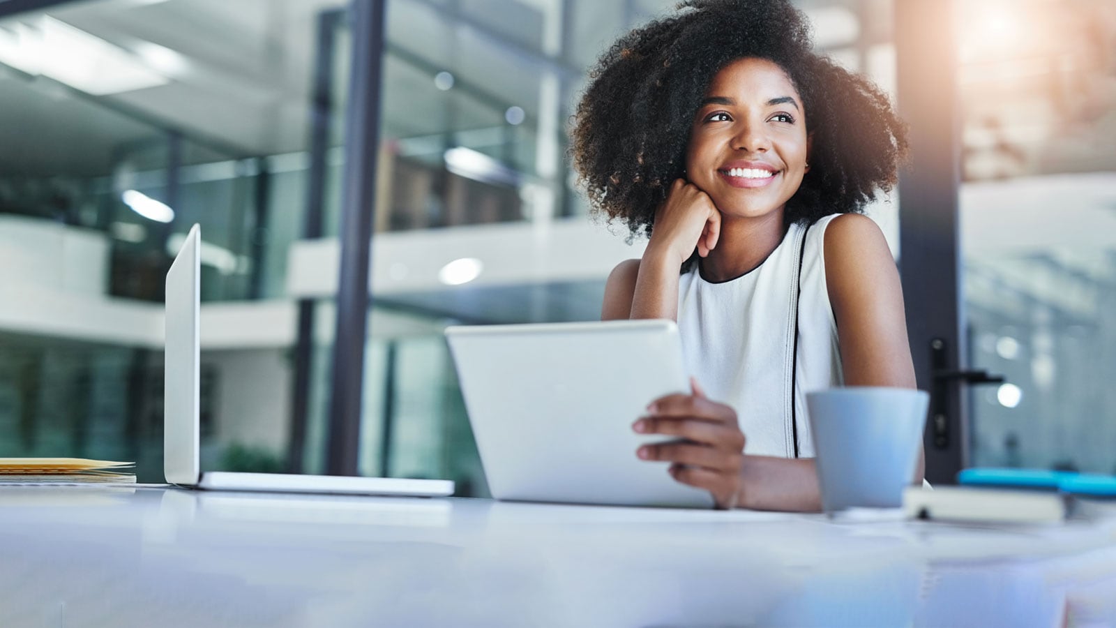 Woman working on her laptop.