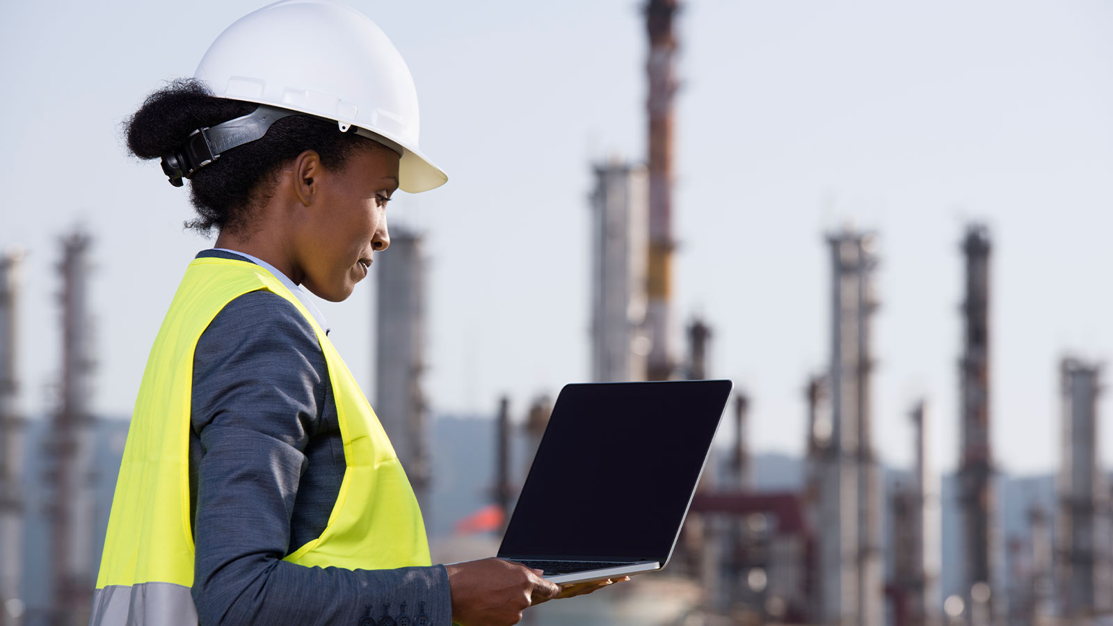 Woman working on her laptop.