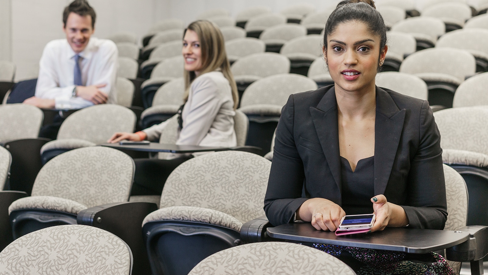 Professional sitting in the auditorium