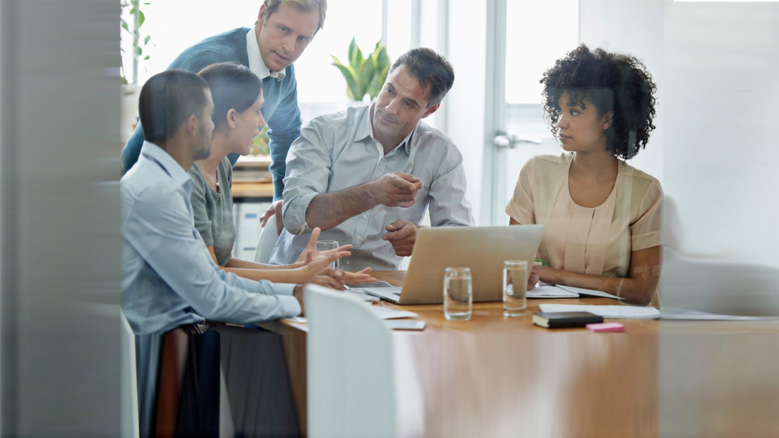 People sitting together at a meeting table