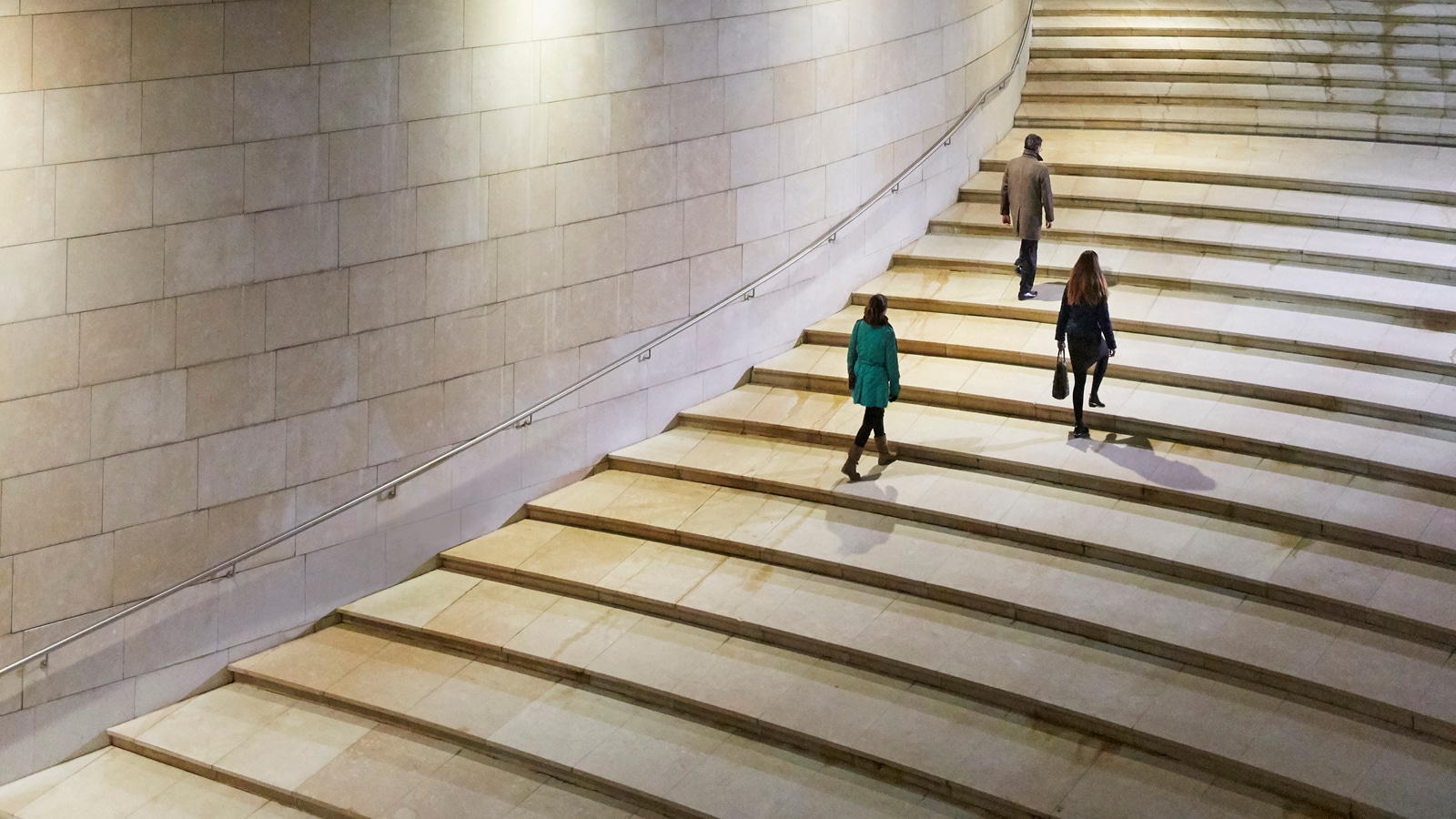 People walking up stairs.