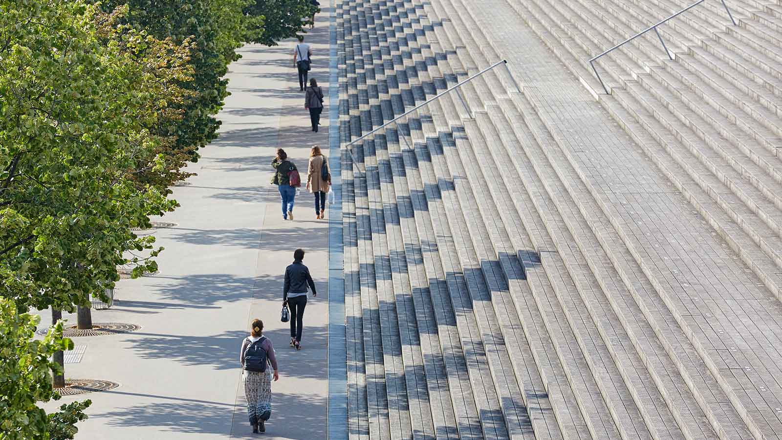 People walking on a sidewalk.