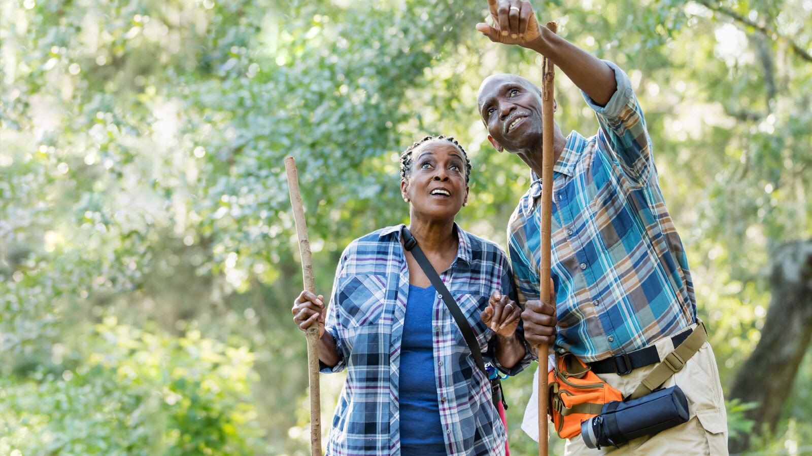 Man and a woman hiking.