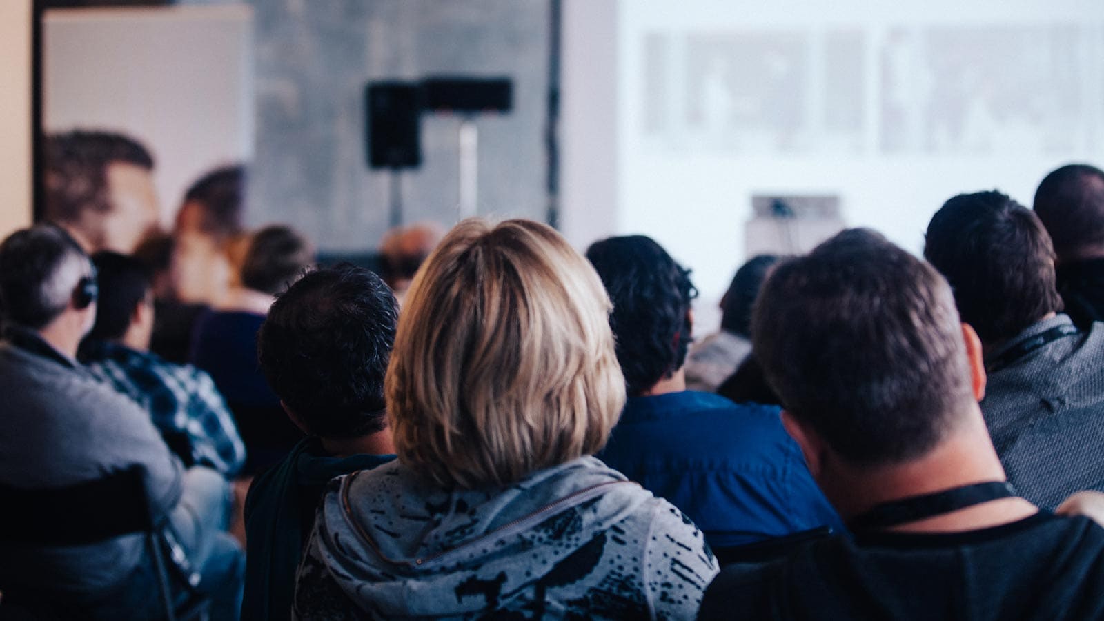 People listening to a presentation.