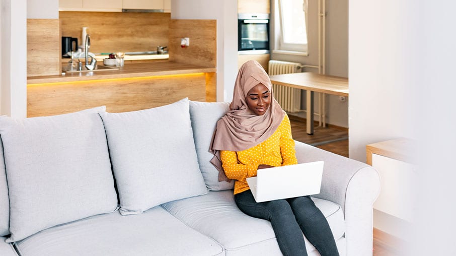 Woman working on her laptop.